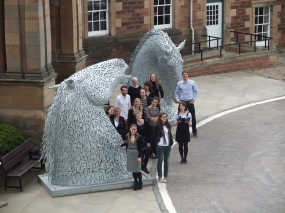 students and kelpie outside Craighouse